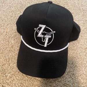 Black Cap with White Embroidered Zach Top Logo and Rope